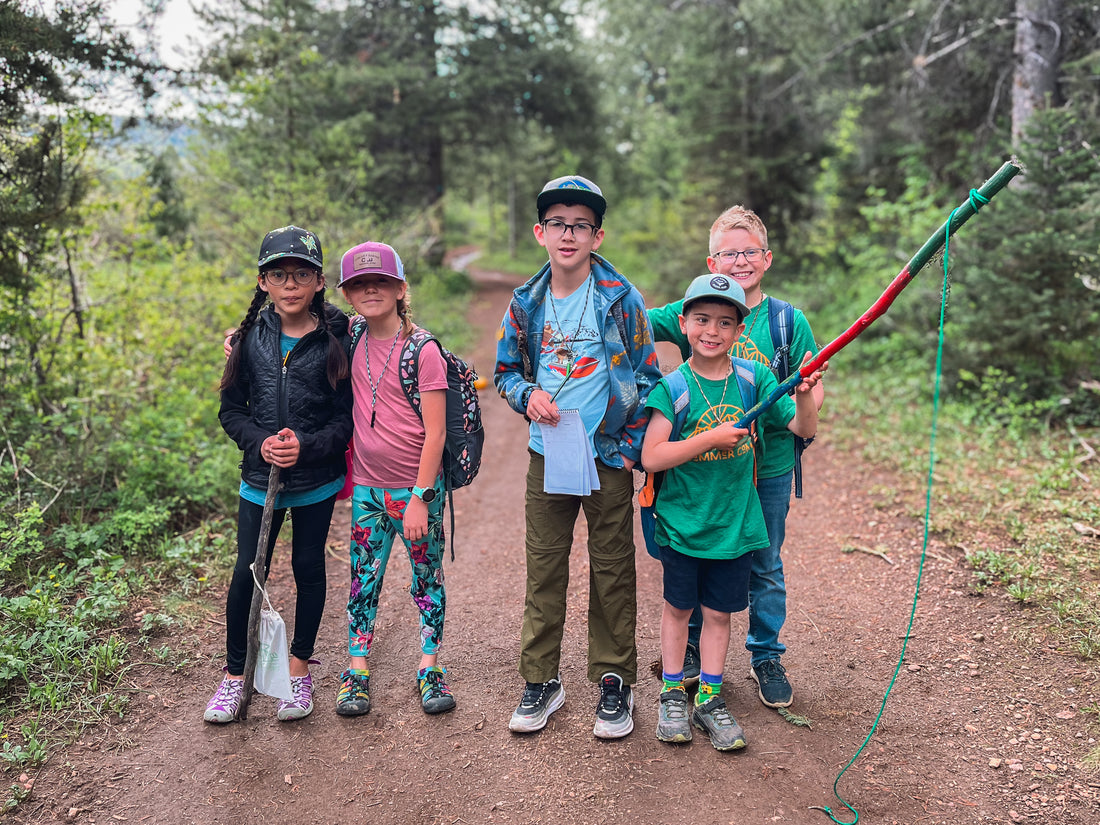 Campers pause on the trail for a photo.